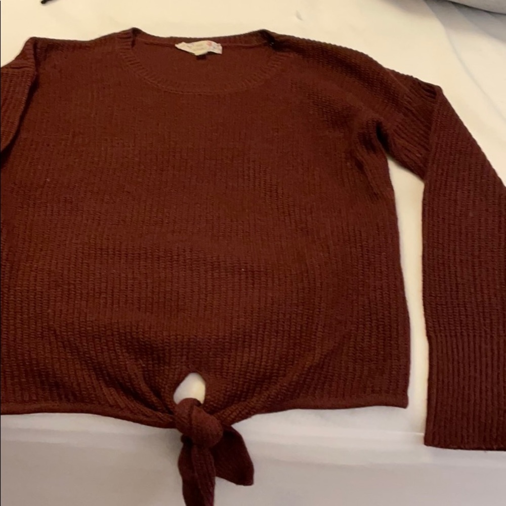 Red sweater with tie at the bottom small s